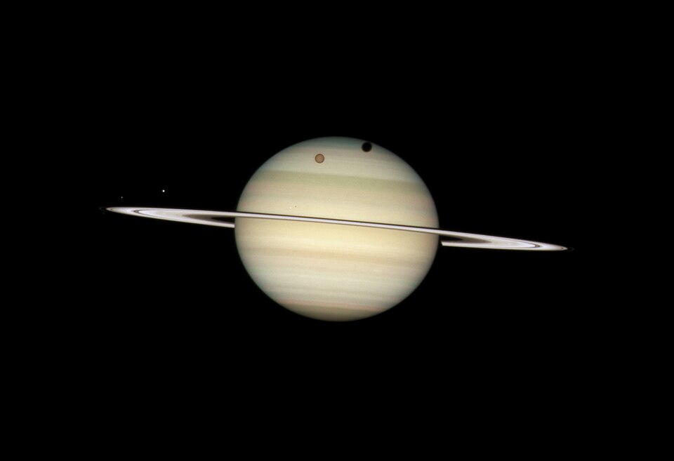 Rare Celestial Event: Titan's Shadow to Cross Saturn This Summer