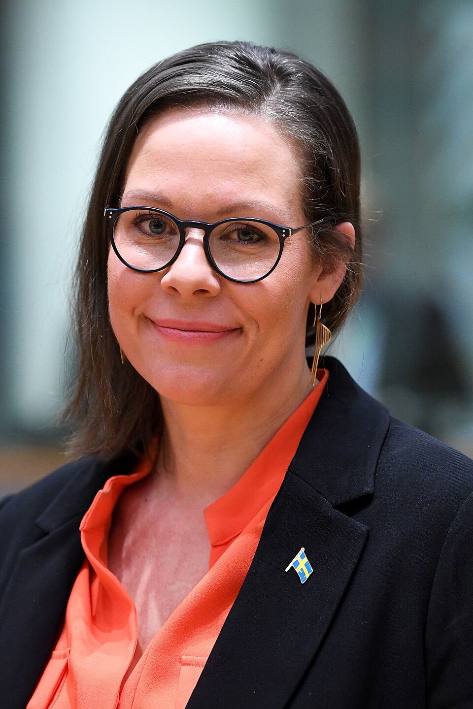 Sweden's Migration Minister Responds to Son's Far-Right Involvement